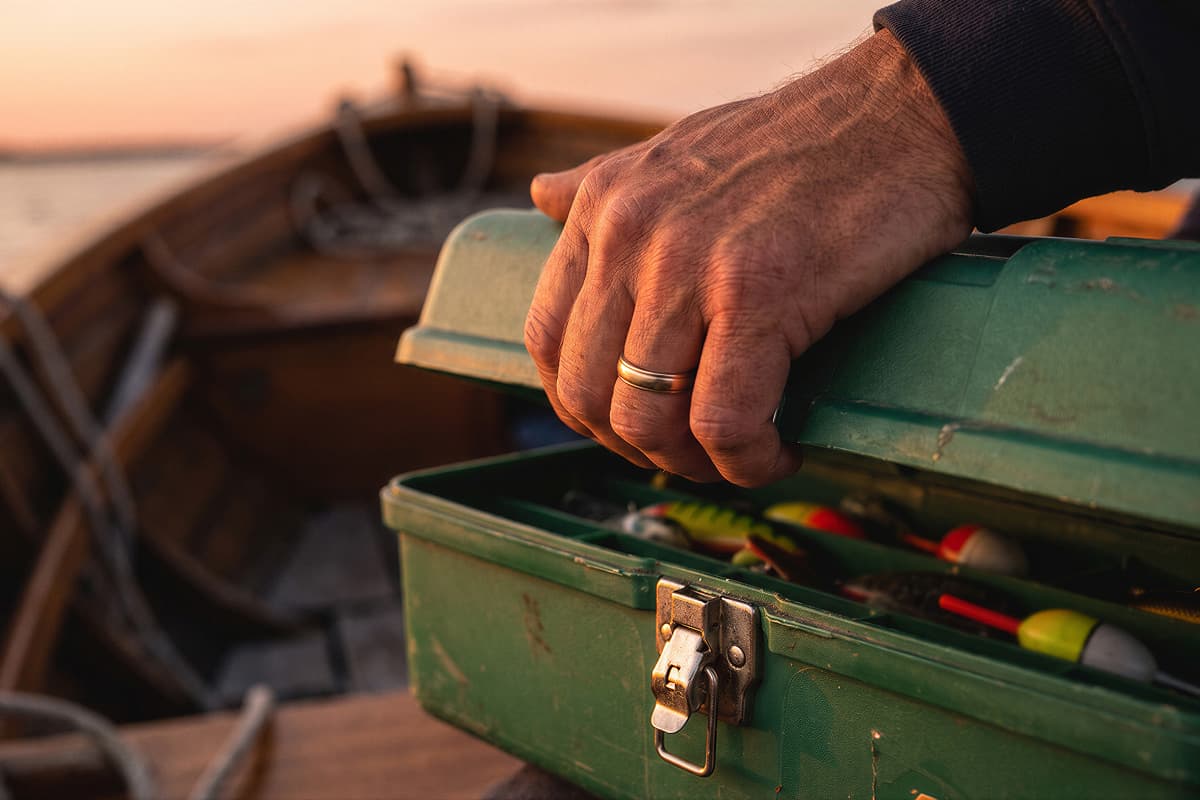 Open tackle box filled with fishing lures
